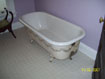 Briles House newly renovated. The old bath tub was kept and looks great with the new bathroom. The old wallpaper was removed however the border was kept. The old wallpaper was placed in a frame and displayed in each room.