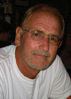 John D.  Briles